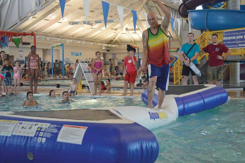 Playing on inflatables in the pool Playing on inflatables in the pool