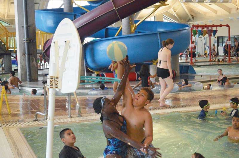 Kids playing water basketball Kids playing water basketball