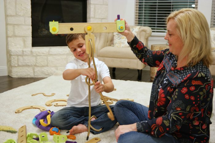 Mother and son play with the Rig Junior Mother and son play with the Rig Junior
