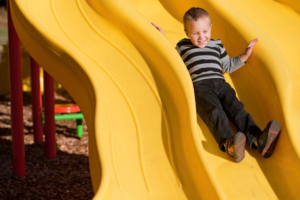 Child on a slide. Child on a slide.