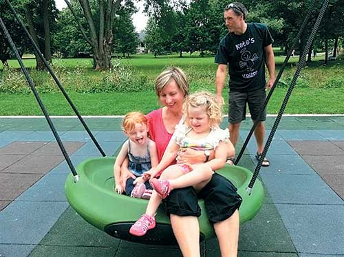 family swinging on large bowl swing family swinging on large bowl swing