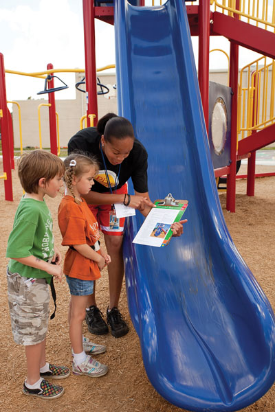 Children being instructed on playground Children being instructed on playground