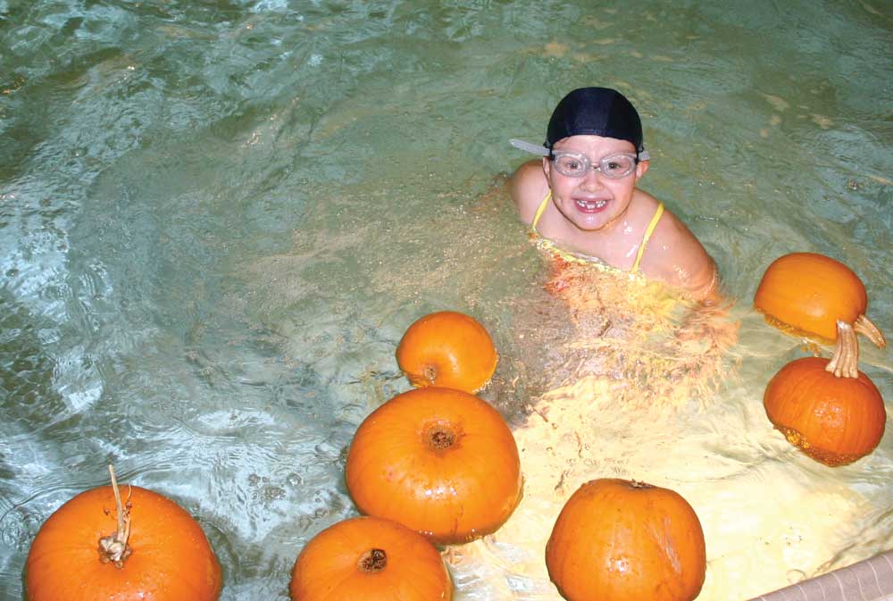 Bobbing for pumpkins in the pool Bobbing for pumpkins in the pool