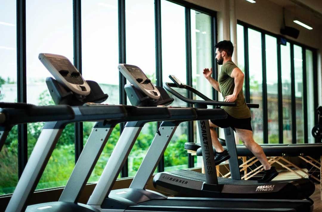 Man running on treadmil Man running on treadmil