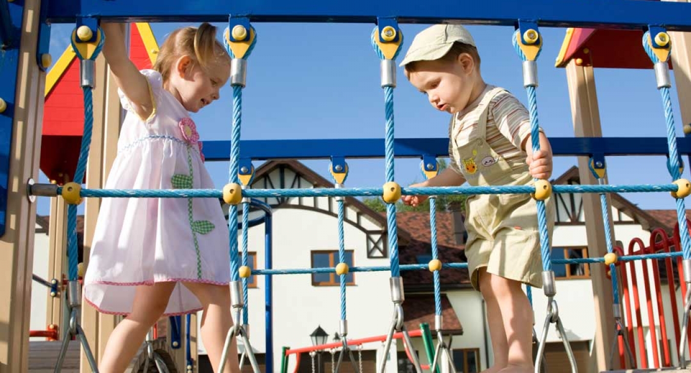 Children playing safe on a playground