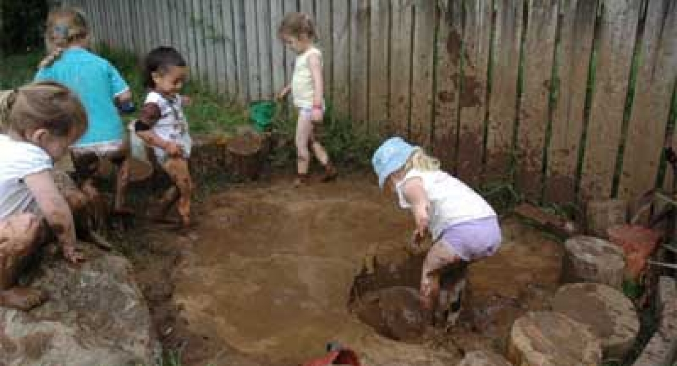 Having fun in the mud - Open Spaces Preschool in Whangarei, New Zealand
